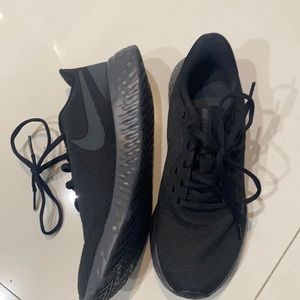 Brand new Nike revolution black running shoes